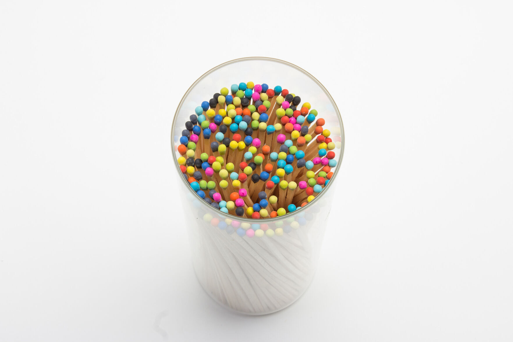 Fredericks and Mae's rainbow-hued matches come in a cork-topped glass tube with a strike pad on the bottom.